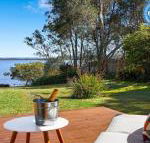 Braeside waterfront fireplace - Nambucca Heads Accommodation